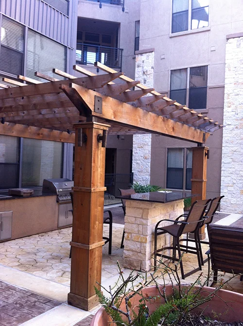 outdoor-kitchen-pergola-arbor-stone-design-build-construction-cedar-the-woodlands-spring-magnolia-cypress-envy.jpg