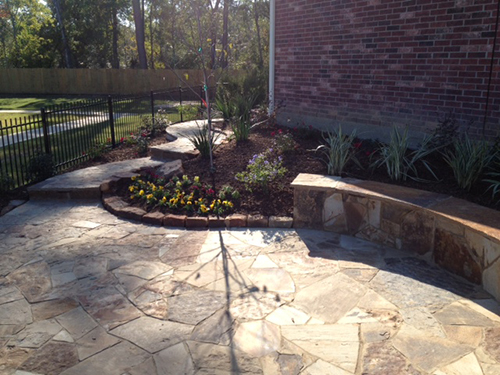 outdoor-seating-area-flagstone-hacket-stone-beautiful-seating-wall-stairway-hardscape-commercial-residential-installtion-builder-landscaper-the-woodlands-houston-spring-magnolia-conroe-montgomery-cypress.jpg