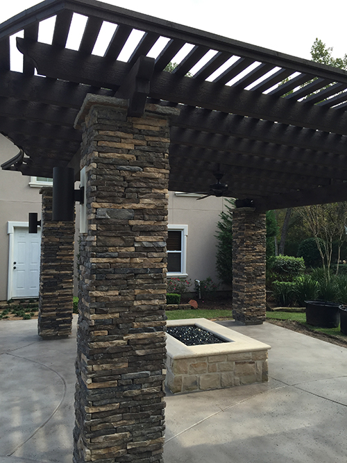 stone-stone-columns-dry-stacked-stacked-cultured-coronado-pool-arbor-limestone-hill-country-houston-the-woodlands-builder-envy-best-aggie-pergola-custom-design-landscape-spring-cypress-montgomery.jpg