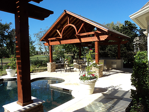 Western-red-cedar-pergola-with-8x8-posts,-4x12-beams,-2x6-joist-and-composite-roof,-Humble-Texas.jpg