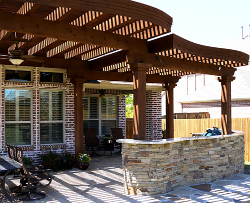 wood-pergola-arbor-covered-outdoor-kitchen-built-in0green-egg-new-home-flagstone-brick-limestone-by-pool-builder-best-installation-installer-landscaping-landscaper-the-woodlands-spring-montgomery-houston-conroe-cypress.jpg