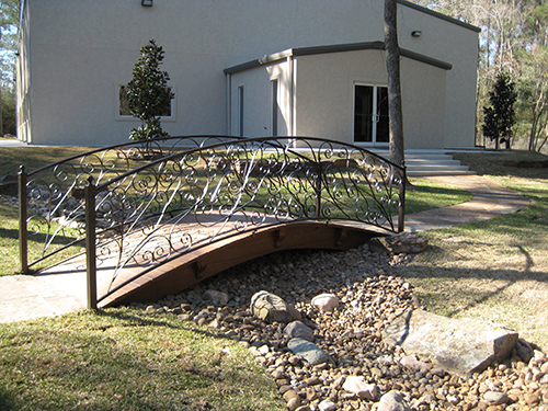 wrought-iron-bridge-scroll-custom-installation-magnolia-the-woodlands-spring-rock.jpg