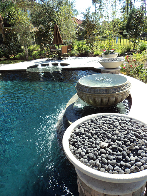 cast-stone-fire-firebowls-urn-lava-rock-pool-pools-ideas-accents-custom-design-build-builder-the-woodlands-tx-houston-montgomery-cypress-spring-woodforest-gas-gas-ring-custom-luxury.jpg