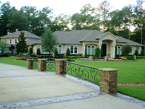 custom-landscape-design-stone-zoysia-envy-installation-the-woodlands-magnolia-houston-wrought-iron-bridge-scroll.jpg