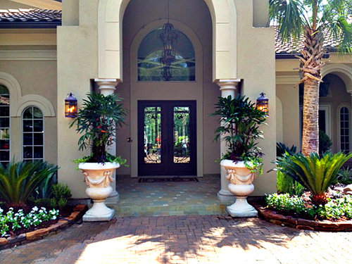 entry-landscape-pottery-urns-palms-stone-border-pavers-the-woodlands-carlton-woods-envy-exteriors.jpg