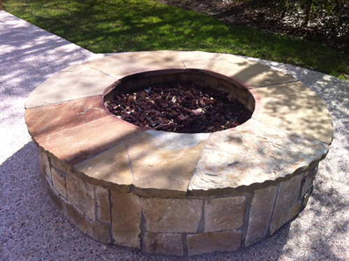 Firepit-fire-feature-glass-round-stone-landsacpe-the-woodlands-spring.jpg