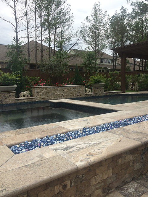 new-pool-construction-pool-builder-the-woodlands-tx-houston-custom-design-build-travertine-pebble-tec-pebble-sheen-landscape-fire-feature-best-aggie-owned-spring-montgomery-cypress-magnolia.jpg