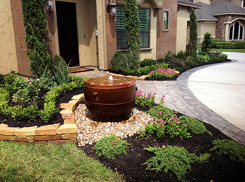 urn-pot-pots-pottery-landsacpe-within-landscape-landscaper-design-custom-build-builder-construction-company-fountain-water-inside-urn-planter-the-woodlands-spring-magnolia-montgomery-cypress-conrow-houston-best-top-landscaping-designer.jpg