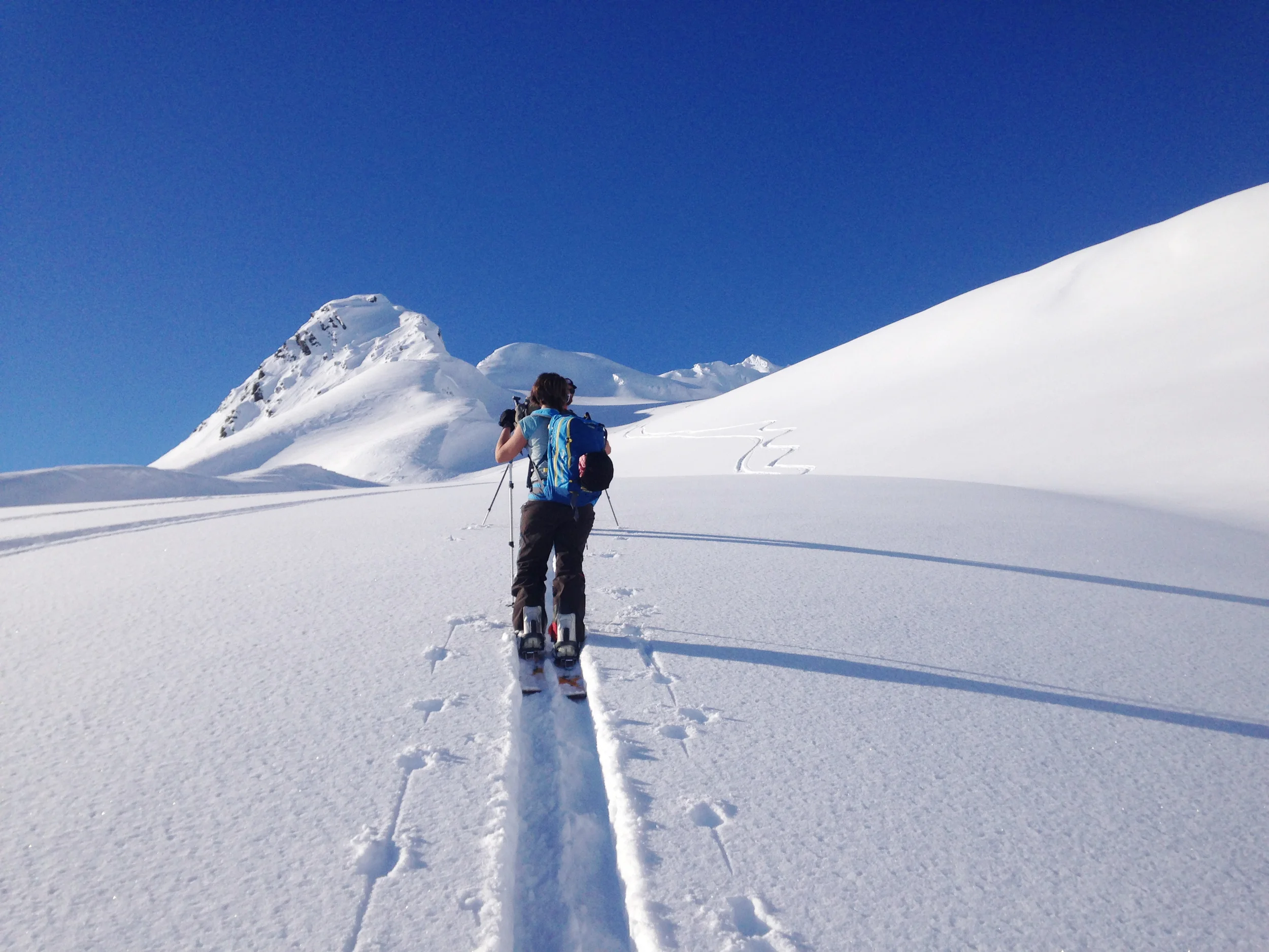 Skinning up to Loveland Peak, Thompson Pass, Valdez. 