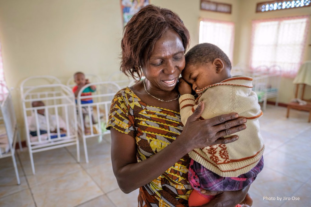 Mama Elyse, as she’s called, taking a moment to do her most important work - share love with children.