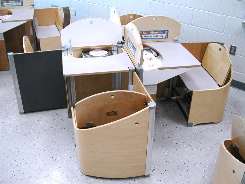 At 22" square when compacted, and 22" x 42" when in use, the Workbox can be easily moved on casters into various configurations and locations. Here it is shown at PS 122 in Queens in a pinwheel that fosters social interaction when the lids are