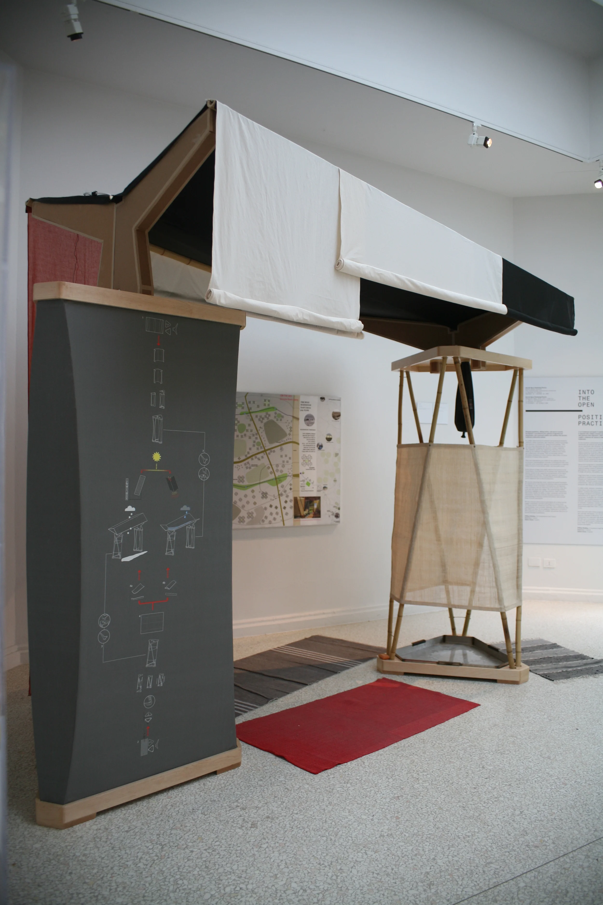  Two "hollow columns" support the roof and enclose domestic infrastructure. &nbsp;The one on the left is a hyper-strong, micro-folded, waterproof paper that is shipped flat and folded on site.&nbsp;&nbsp; 