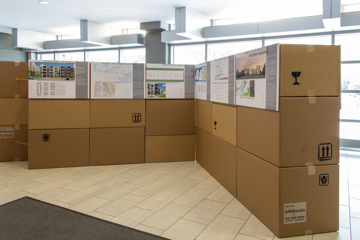 For this exhibit of post-disaster, modular interim housing units, we used moving boxes in a zig-zag formation connected as a comment on the temporary nature of the housing and also as a solution to the budget and time constraints of the exhibit, which was installed in the lobby of The New York City Office of Emergency Management.