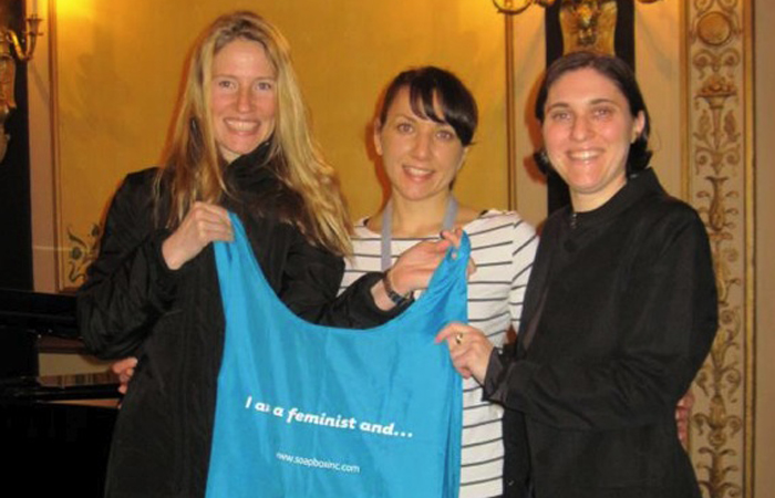 Displaying a bag at the 2012 Association of Writers & Writing Programs conference in Chicago with co-panelists and feminists Melissa Febos and Rachel Simon