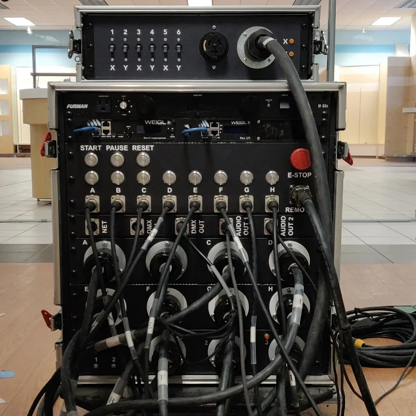 custom racks i designed and built for a touring show. inside are 8 variable frequency drives that are given commands to operate through WEIGL show controllers. controllers also send out audio and DMX for speakers and lights on stage.

#lightingdesign