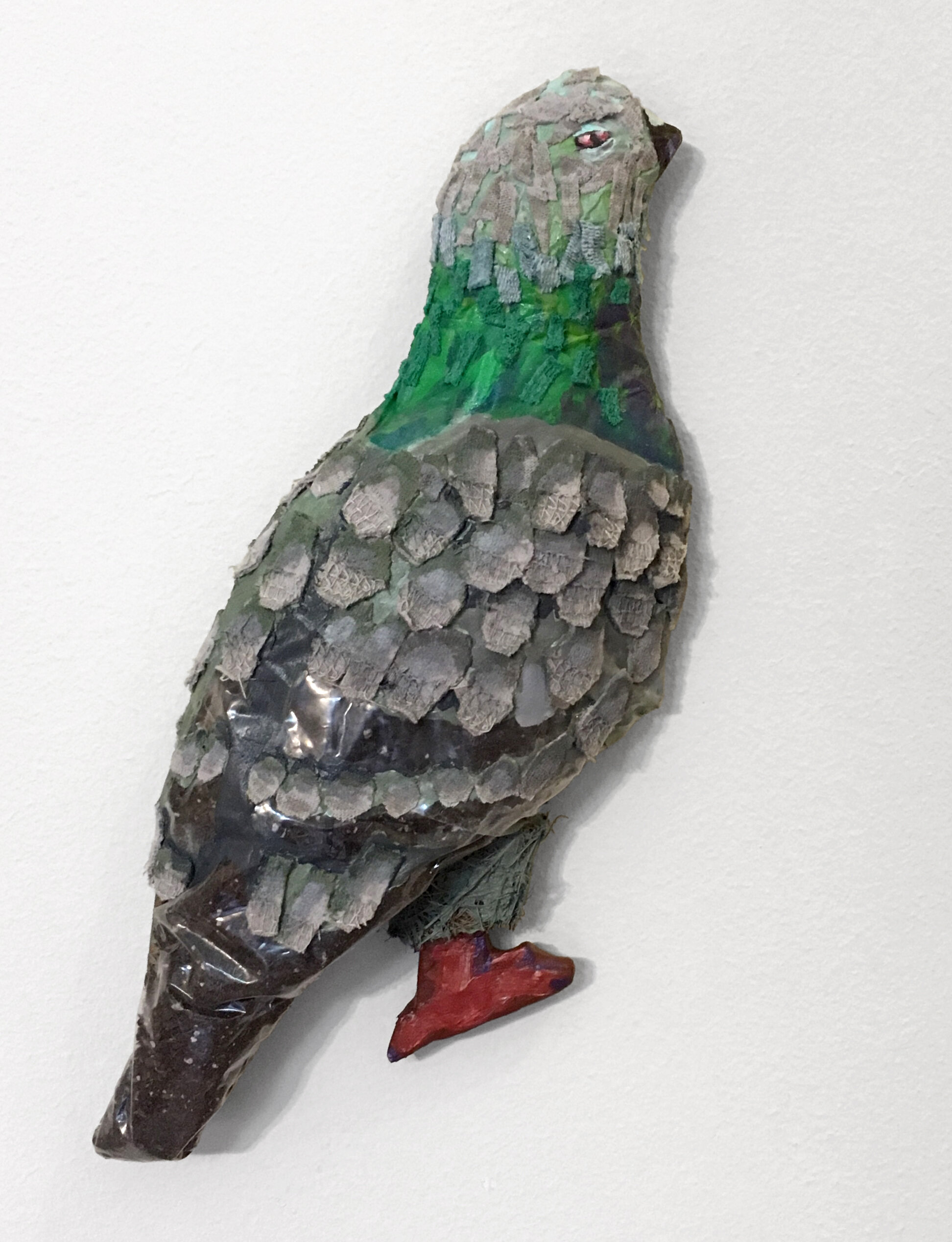  “Guardian Pigeon”, 9h x 4w x 1d in, Acrylic on fabric, cardboard, coconut husk, and plastic bags stuffed with soil, 2019 