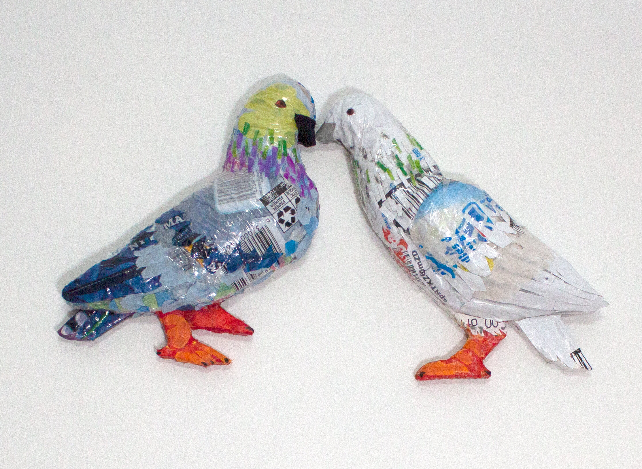  “Matrimonial Pigeons”, Repurposed plastic packaging, bedsheets, synthetic fabric, and cardboard, 9h x 17w x 2.5d in, 2020 