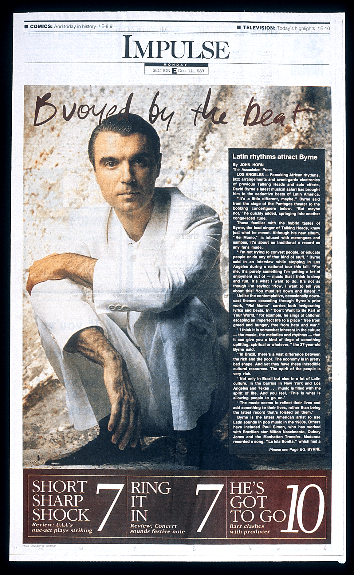 The fun of designing for the pose in the photo. Even though the page was a tall broadsheet, he could never stand up;)