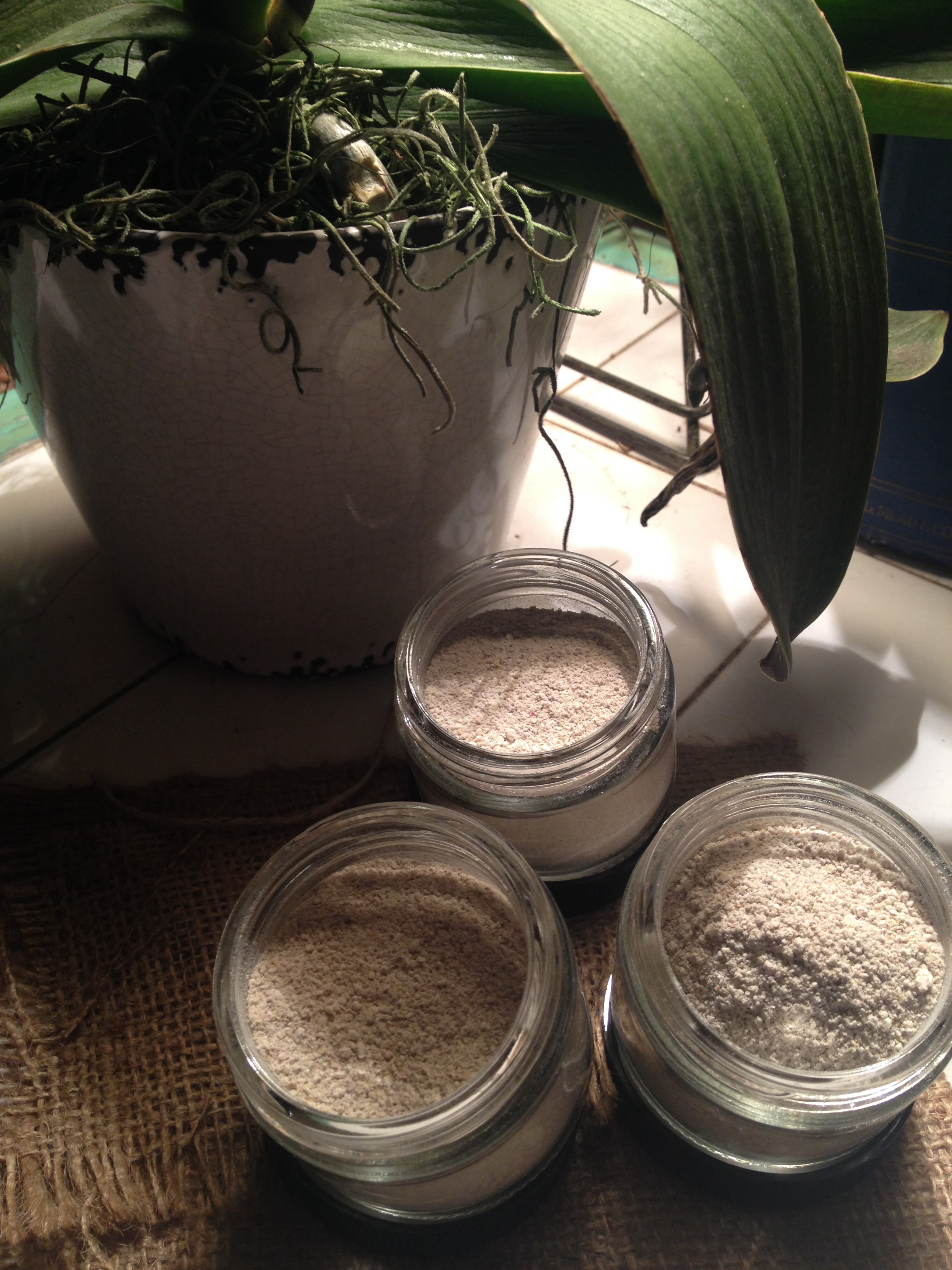 Daily Facial Cleanser and Mask made with organic bentonite clay, organic oats, organic rose petals, calendula, and chamomile.