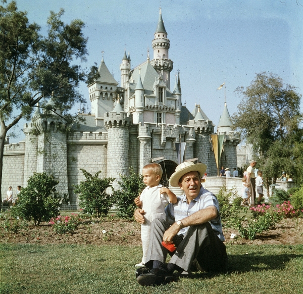 Walt and his grandson taking a break by the castle // Image © Disney