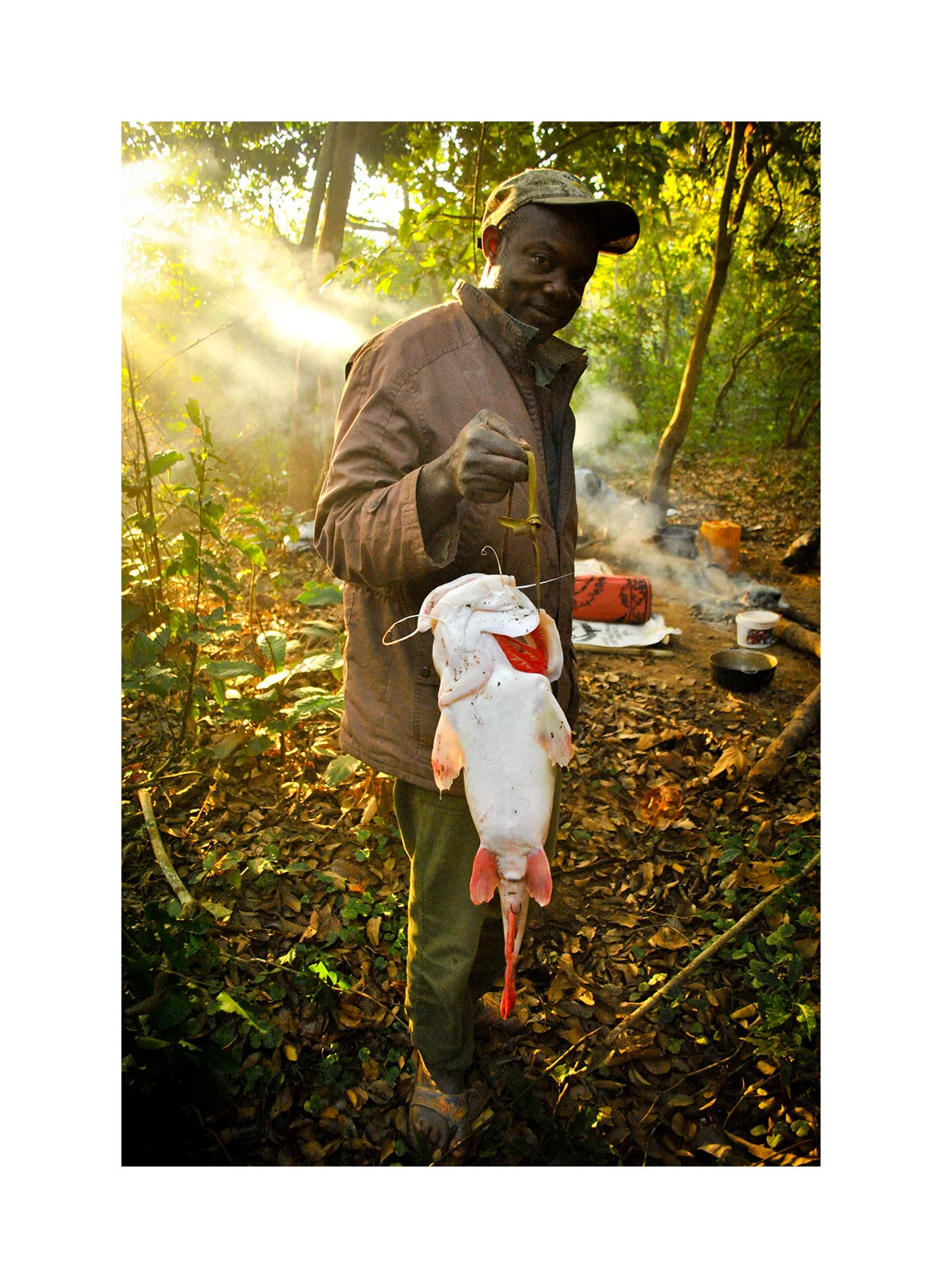 Local fisherman with catch. Chinko Nature Reserve, CAR