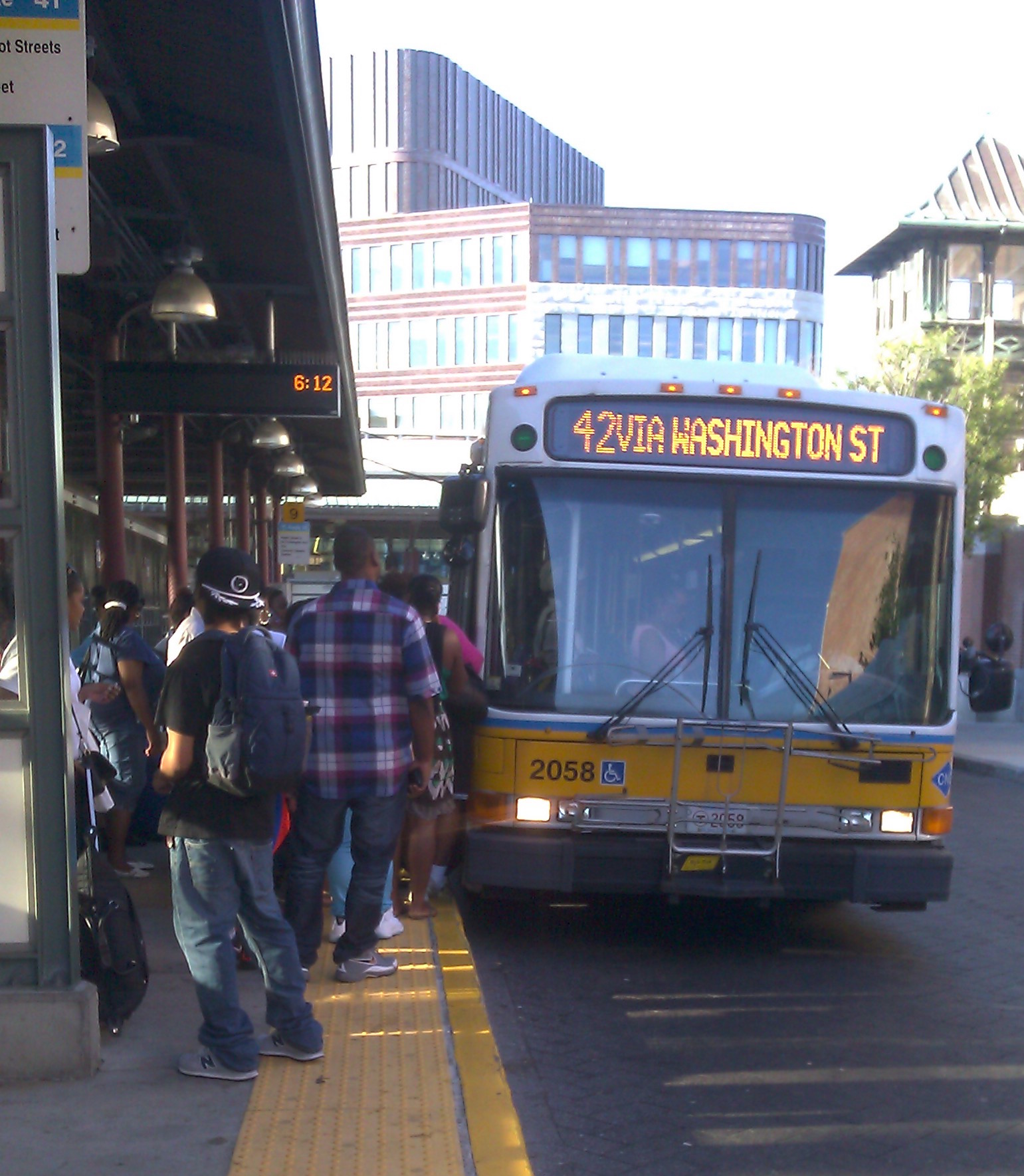 Passengers line up to board Route 42 at Dudley Station, increasing operating costs.