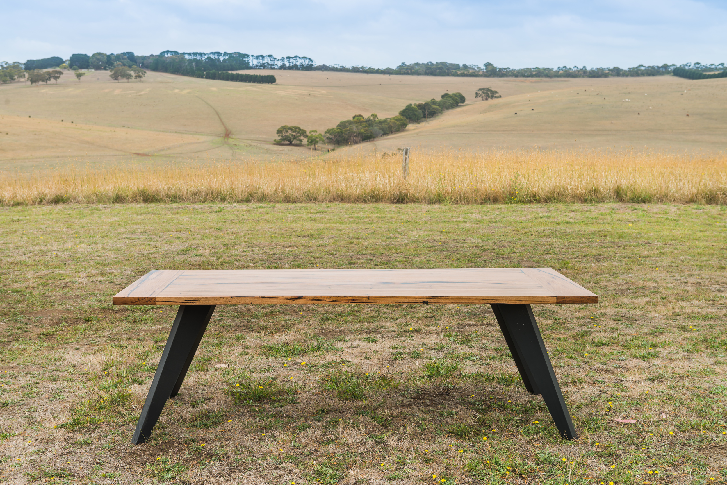 black leg timber dining table