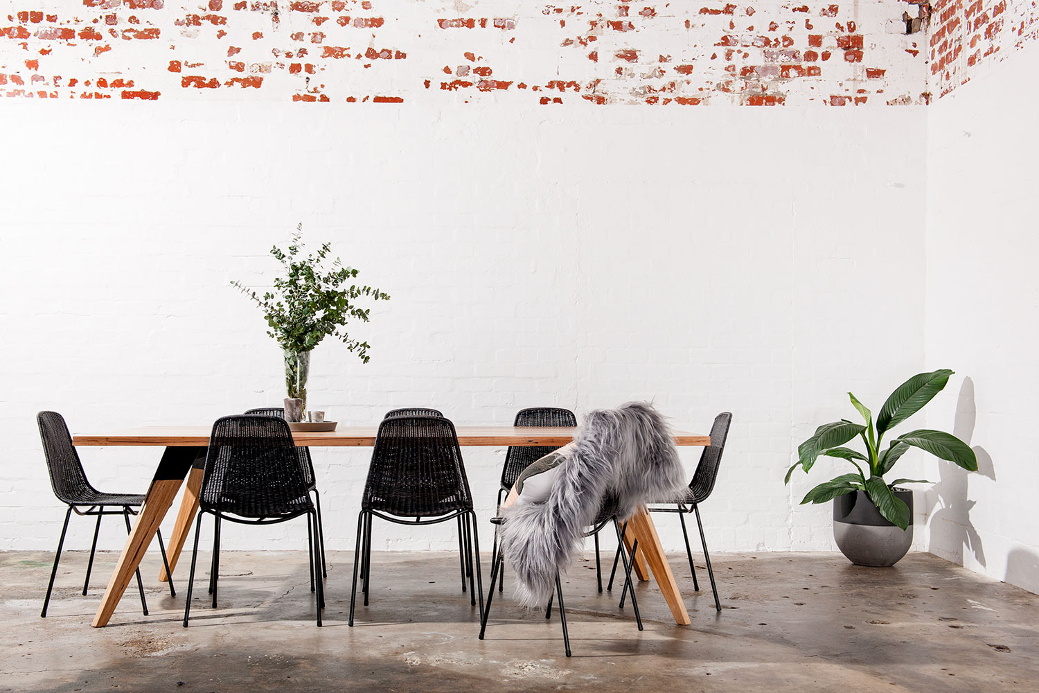 Black and timber dining table