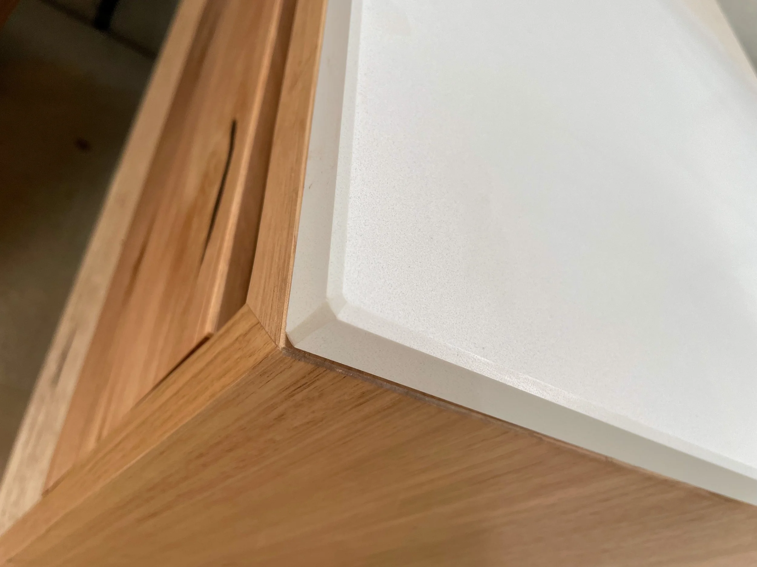 Floating solid recycled timber bathroom vanity with stone top