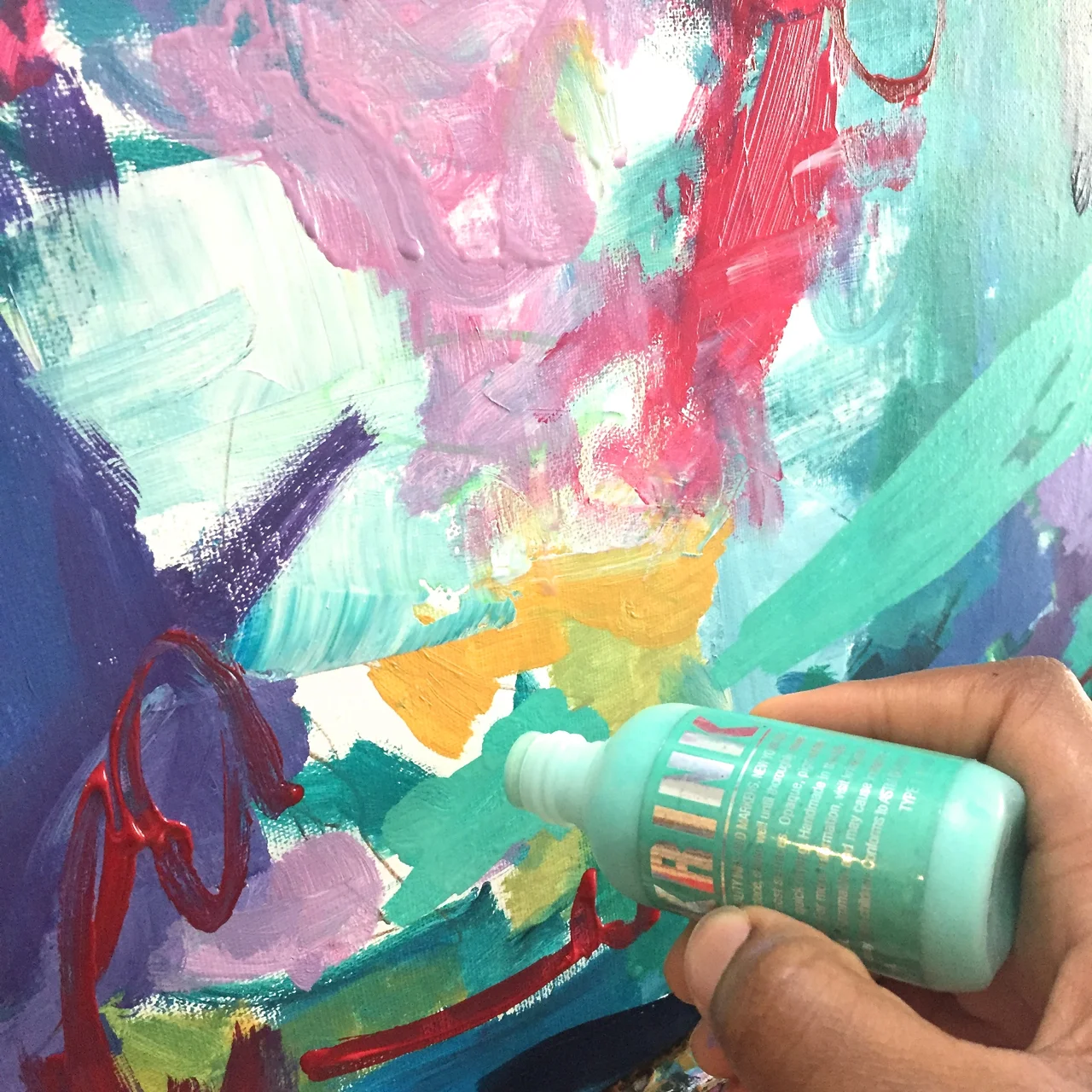 I move right in with my new Krink acrylic paint marker. This teal color grabbed me and boy is it beautiful. It has a nice sheen to it and it drips on the canvas just the way I like my paints! It's a keeper.