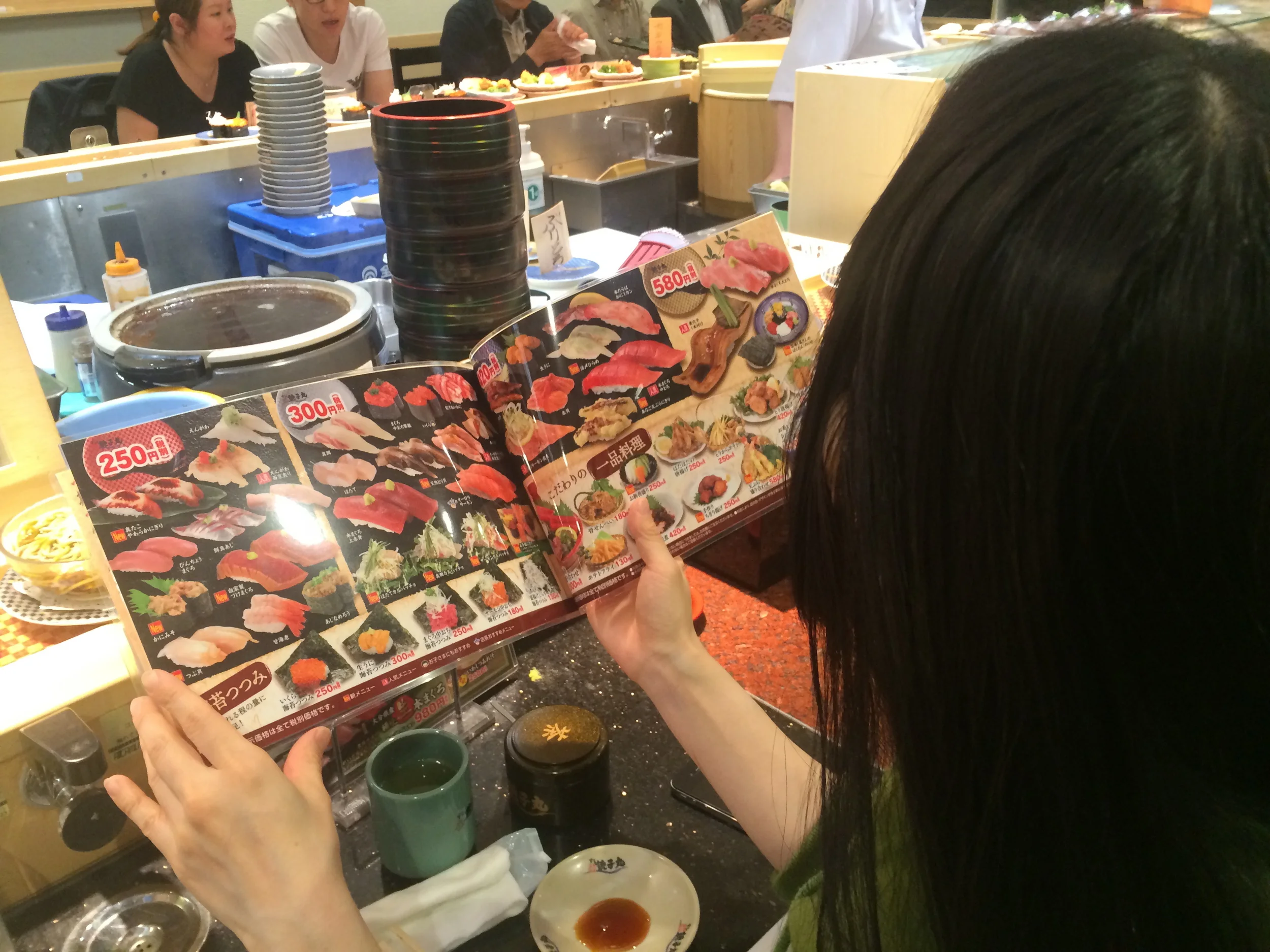 Reiko ordering the food for me..i think we ordered everything in the menu