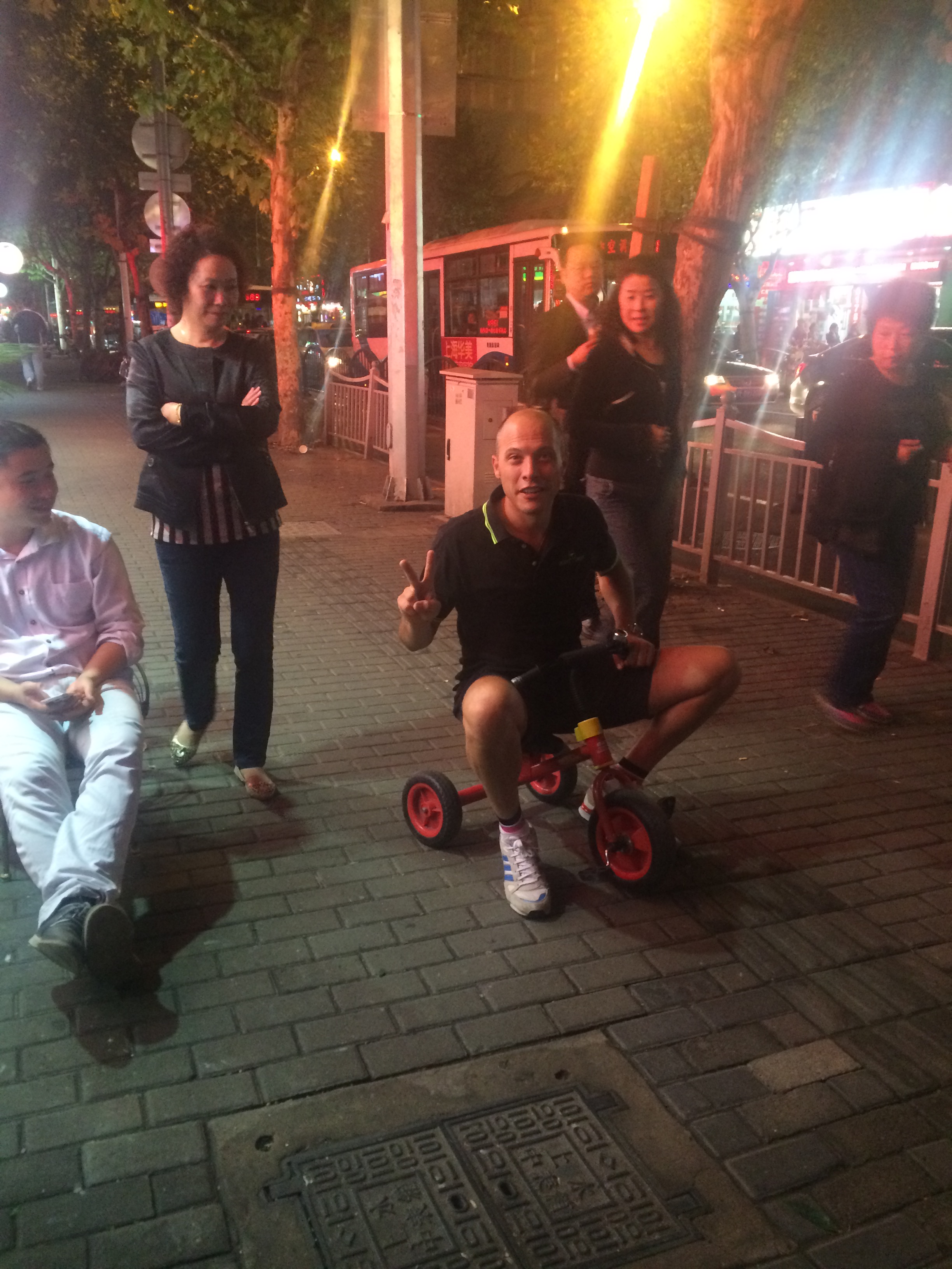 Having fun with some kids bike