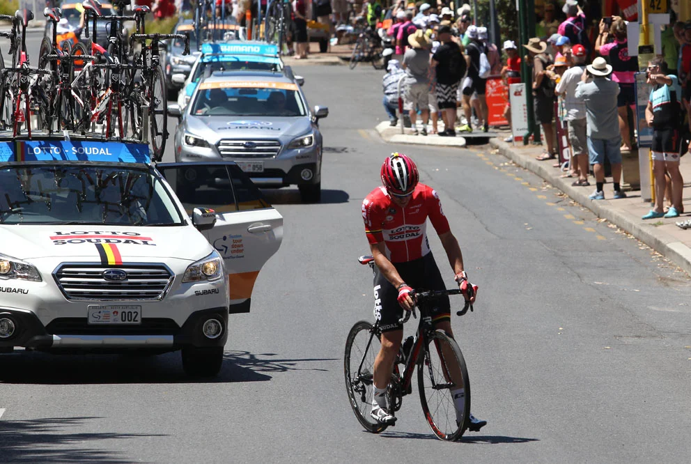 Solo breakaway rider Adam Hansen gets a tyre change