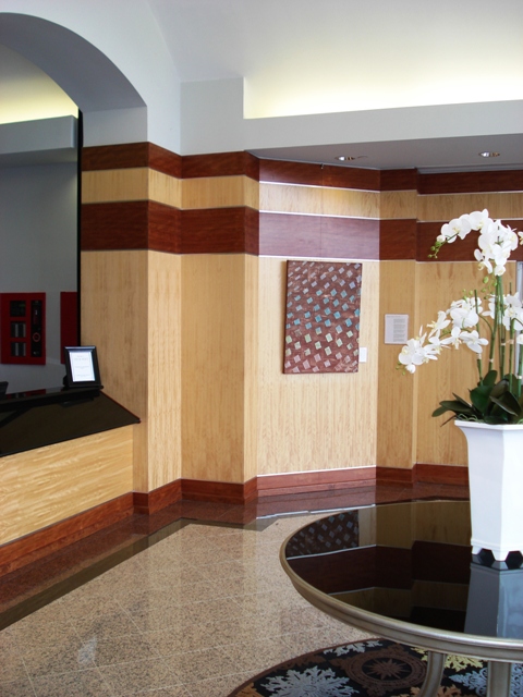 Shown hanging vertically in a lobby.