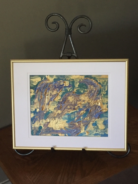 Shown on a table easel.