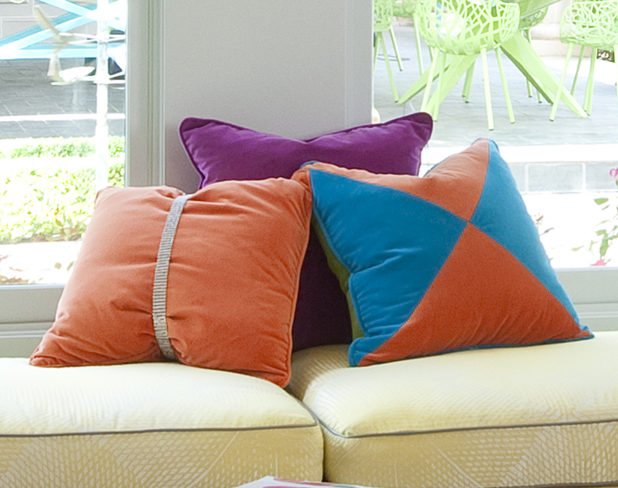 Custom velvet & silk pillows for a client using alternating colors to create a harlequin pattern. Rhinestone belts to cinch solid velvet pillows for a touch of bling. 