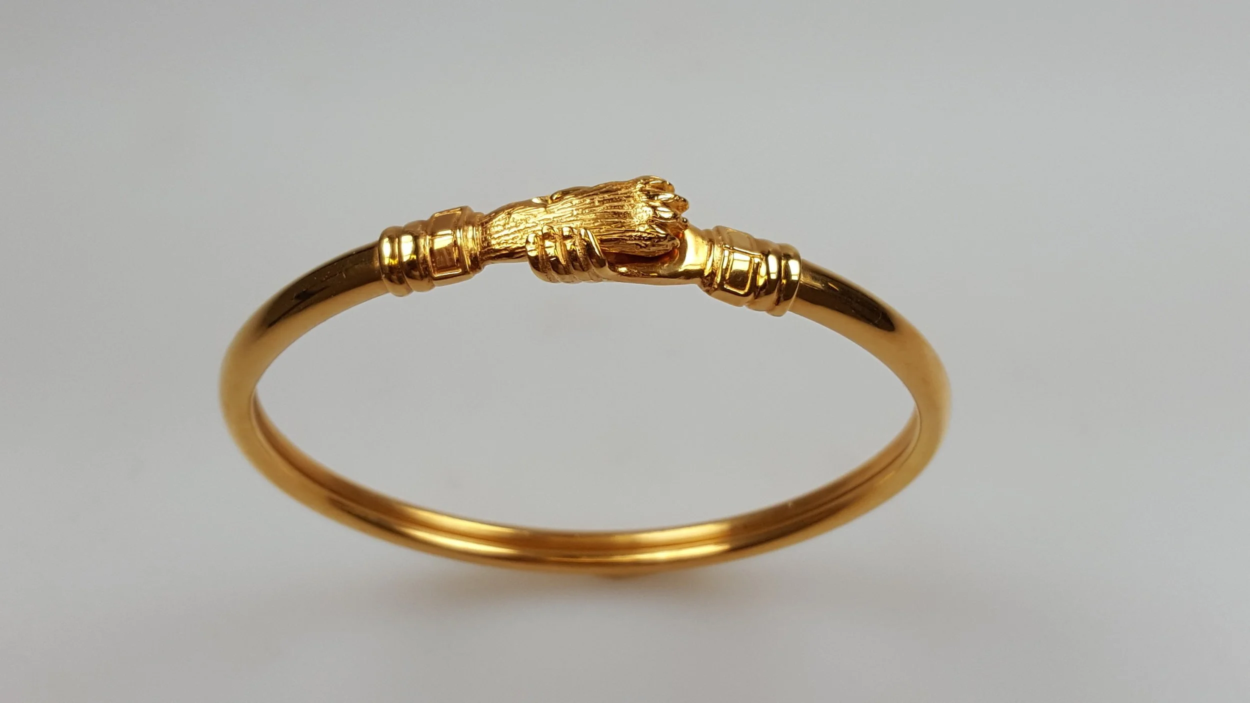 gold+hand+&+paw+bracelet+copy.jpeg