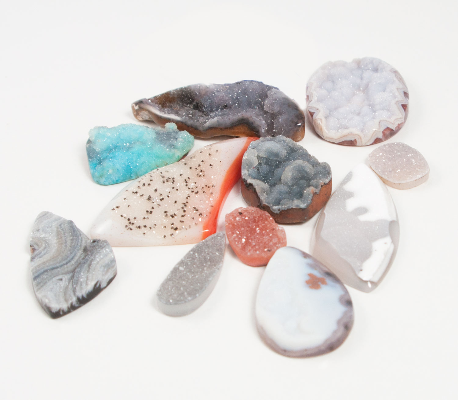 A few untreated drusies in my collection. I love the interest that they will add to any piece.
