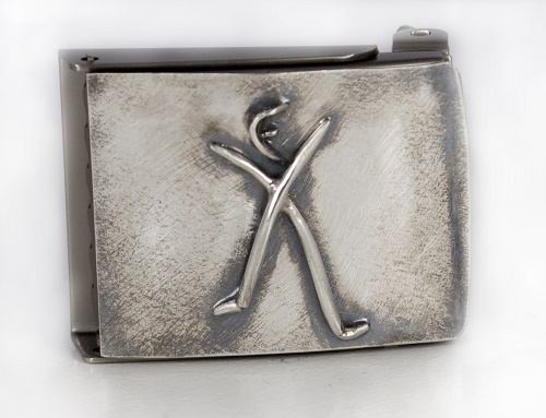 A fully custom belt buckle created for a trainer at FX Studios. The symbol is the FX logo. 