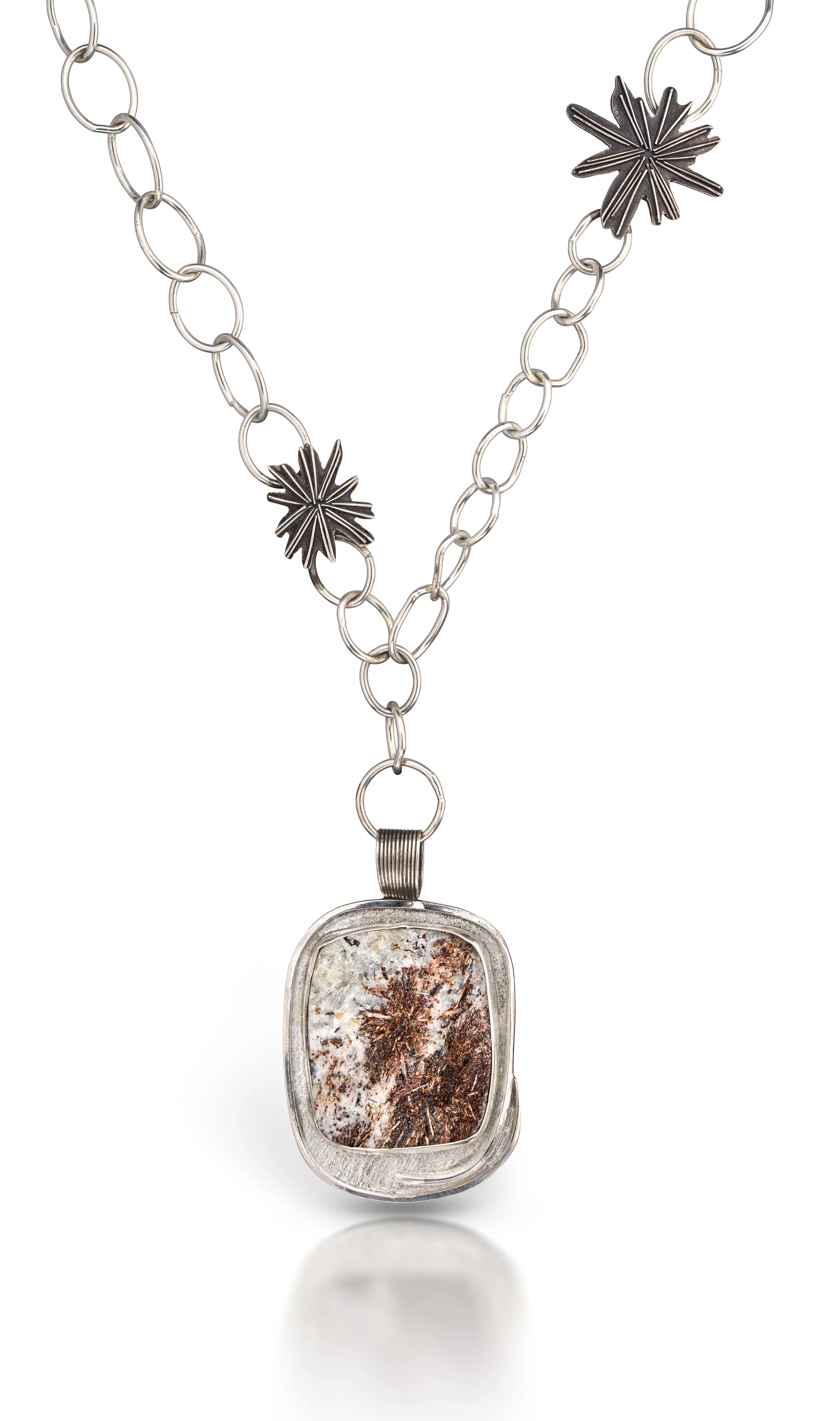 One of my personal favorite gemstones, Astrophyllite, used in the F ireworks necklace
