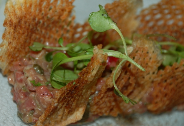 FYI, this is my picture of a delightful beef tartar, served at Bistro Signatures