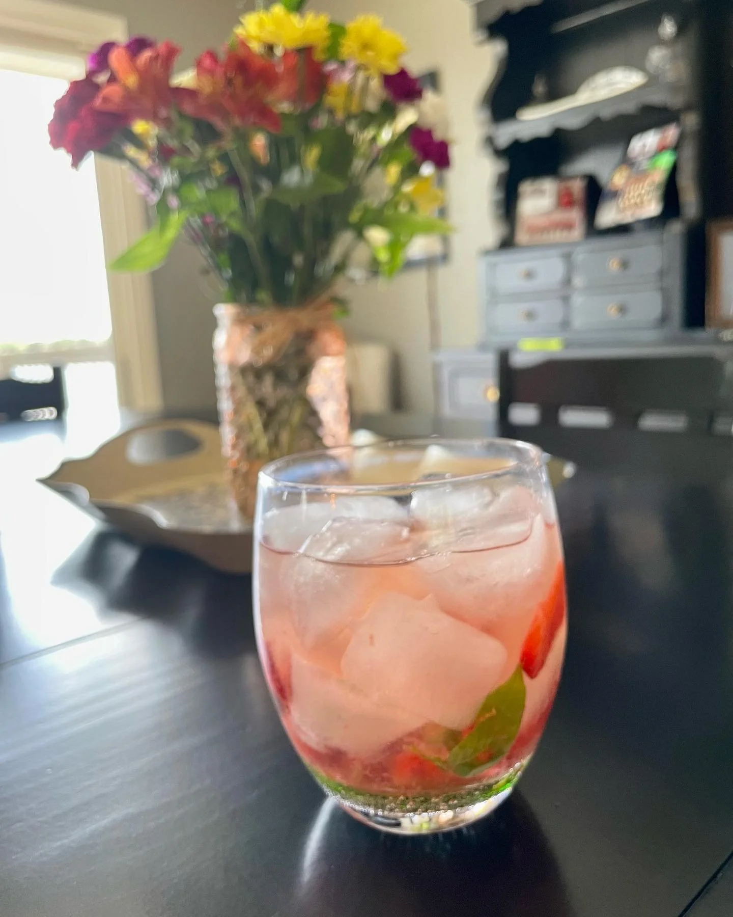 Summer, Friends, Lakehouse. These are a few of my favorite things. 💐 This was the best drink using lemon basil from my own container garden. ❤️ Shoutout to a bestie for this creation - I love how you bring beauty to things and take over my kitchen. 