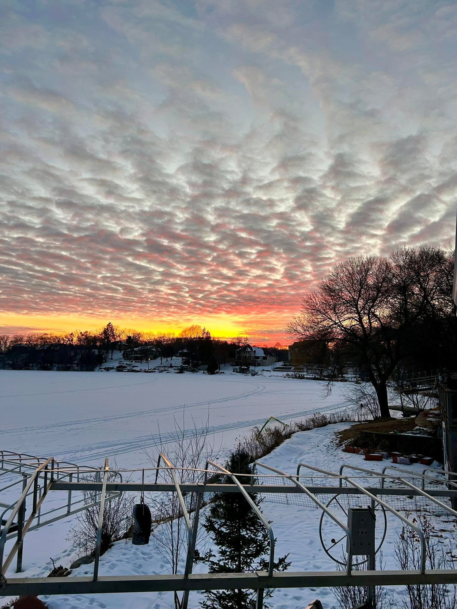 Beautiful evening on the frozen lake (with our headless owl 😆). The plastic owl helps with the barn swallows. They LOVE the boat lift in the summer. I secretly love how the aren&rsquo;t deterred by the fake enemy owl. 💕