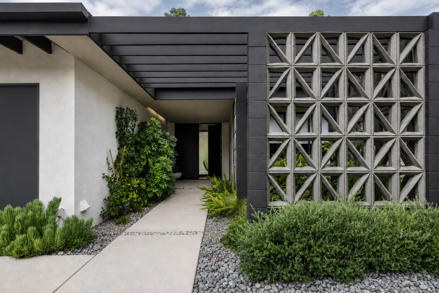  Part of a 1950s development in Studio City. This later mid century home was restored preserving original elements like the central atrium.  