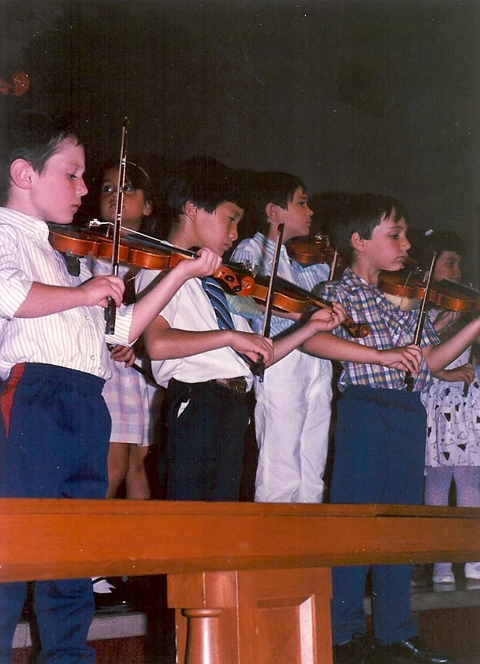 Daniel age 5 in concert.jpg