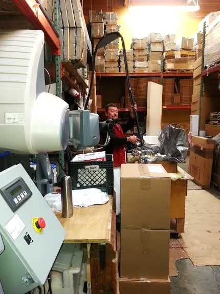 Sal in the back making some custom shippers