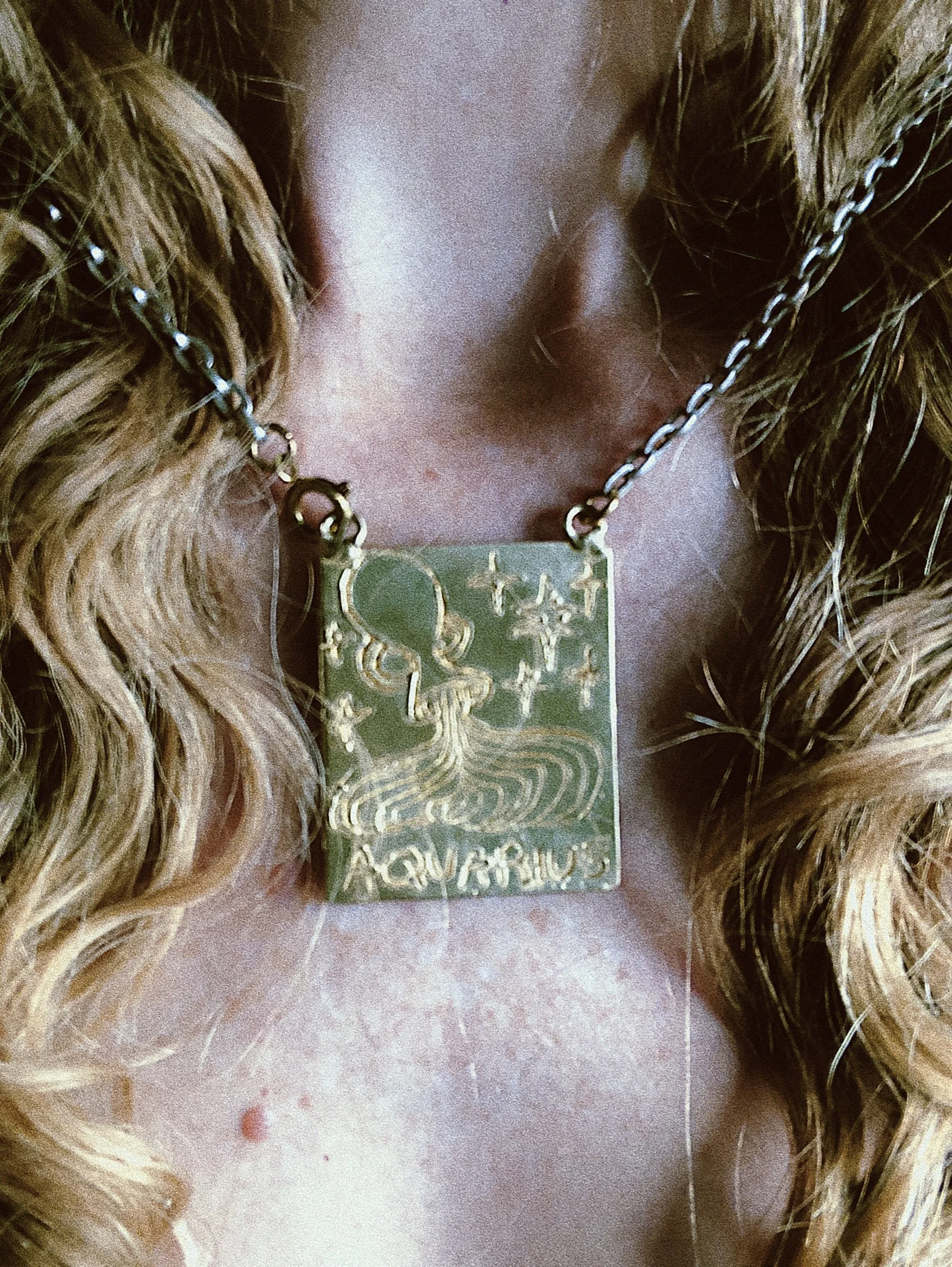 zodiac jewelry, astrology, Aquarius, leo, Pisces, pendant, art jewelry, statement necklace, hand drawn, los angeles, new york