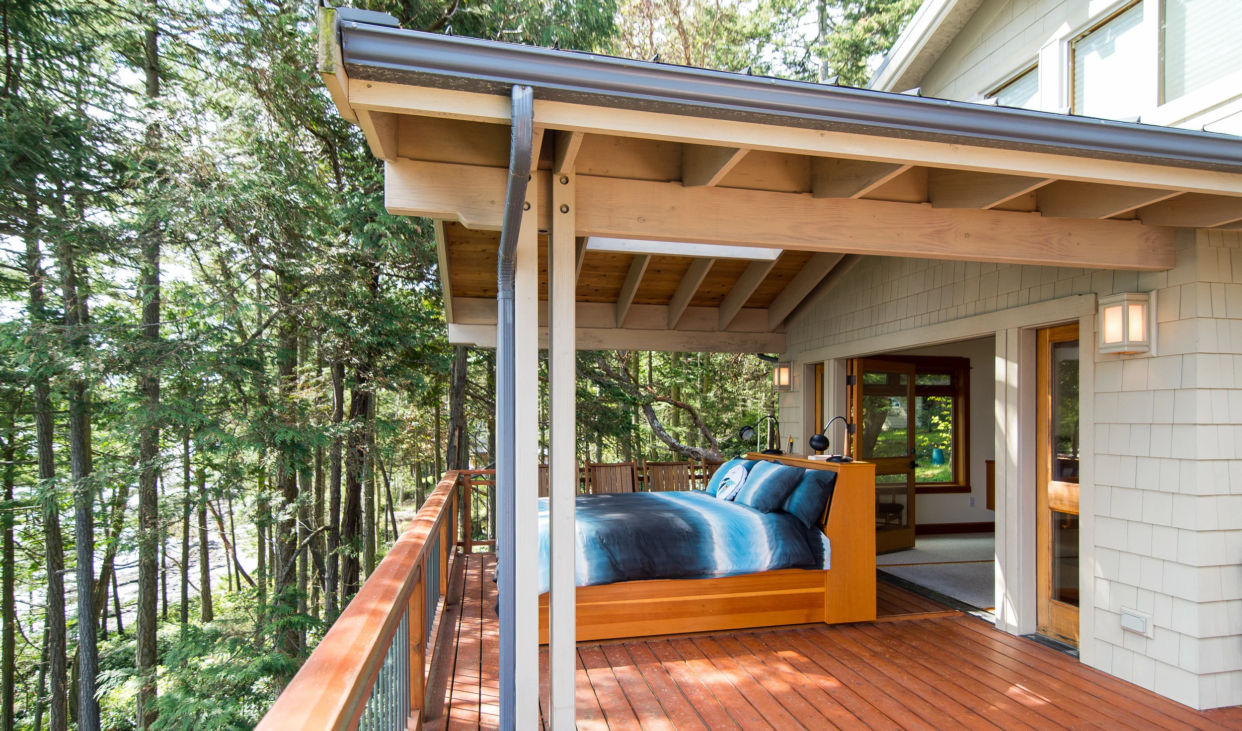 Bed full out on sleeping porch............How cool is that ??