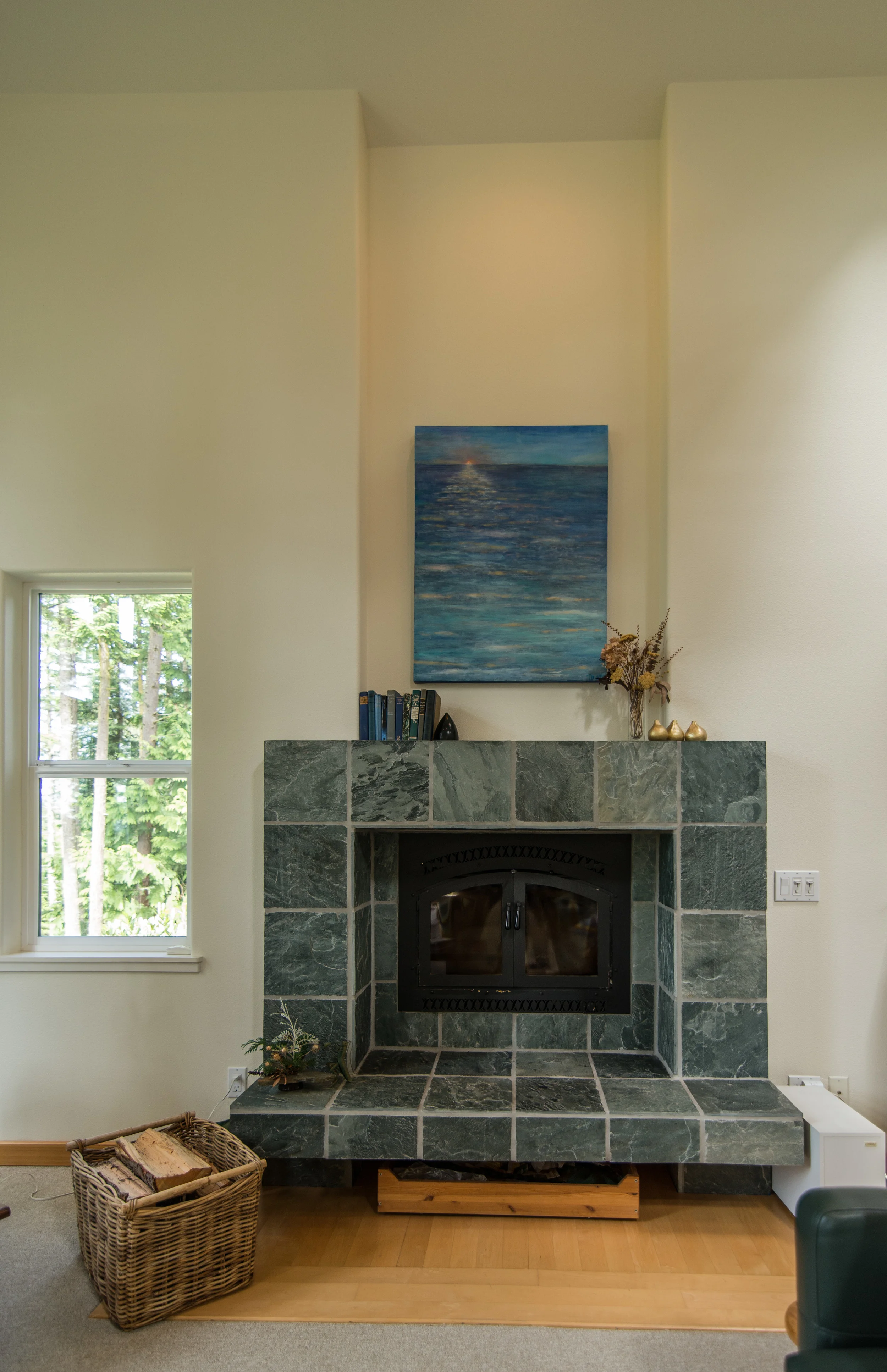 Alice (home owner) designed this fireplace......Love it. Simple elegance!! Good job Alice !