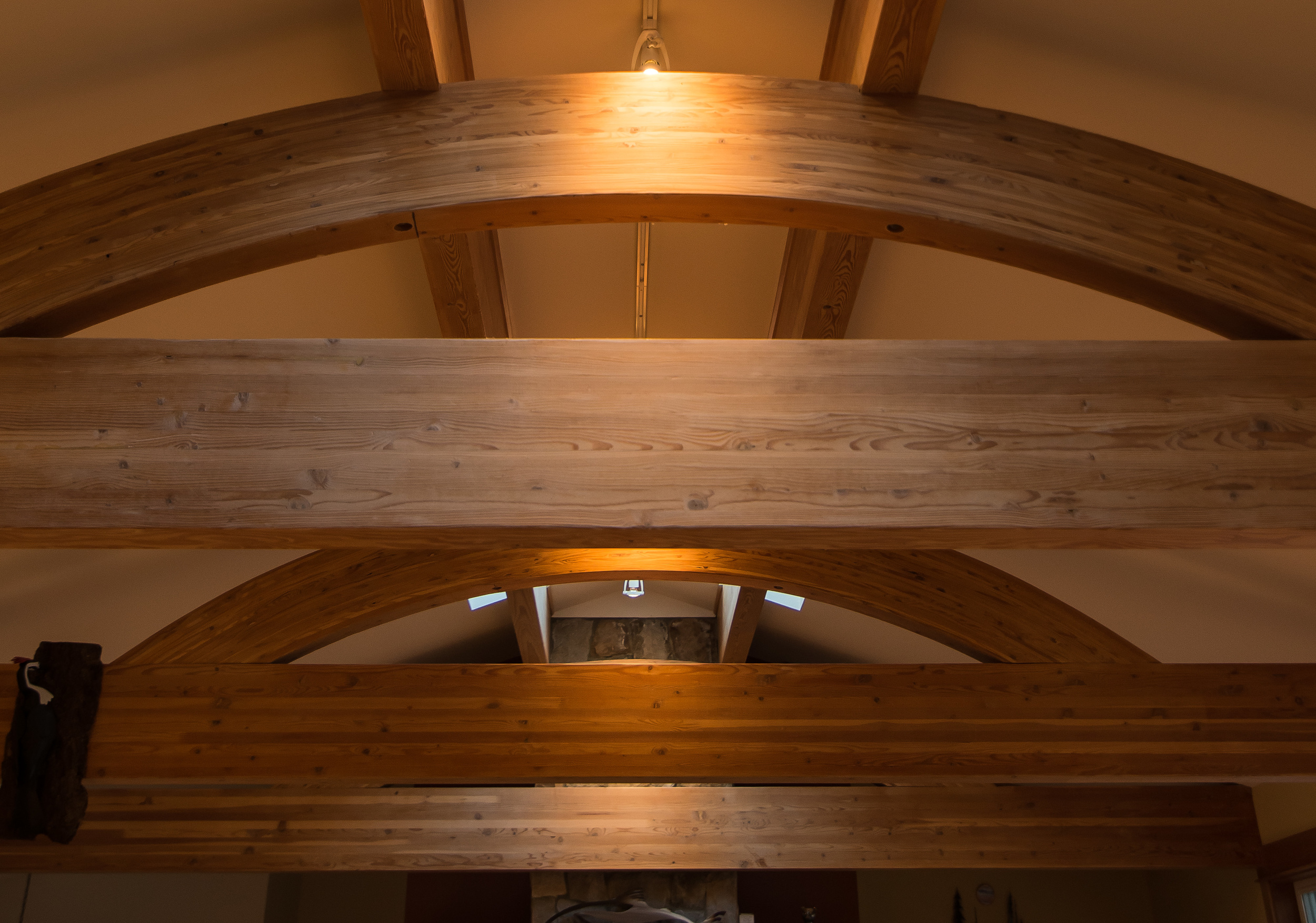 Arched Glulams support pair of ridge beams
